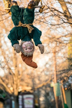 Elf Displays at Gardner Village  - elf hanging from a tree 