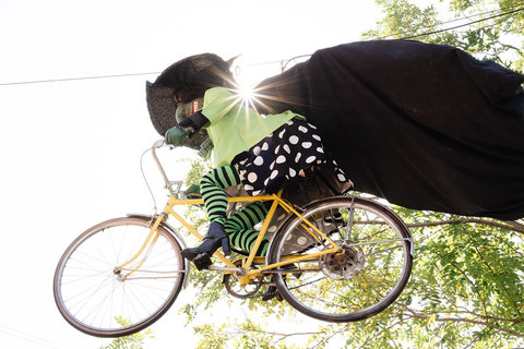 Gardner Village Witch Displays - witch riding a bike 