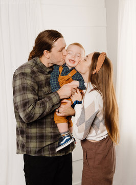 Camera Shy Photography - young couple with their baby boy studio photo 