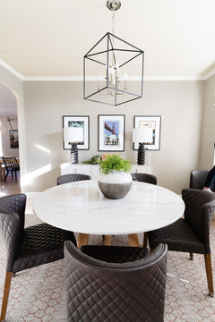 Down to Earth Projects | Draper Residence - small dining room table with leather chairs 