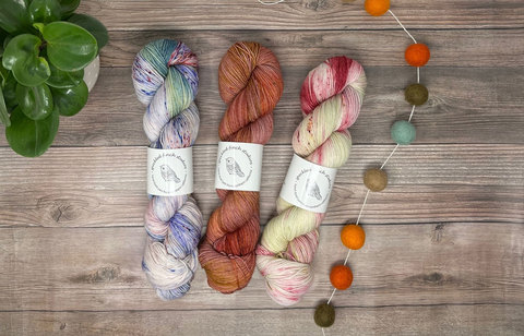 Willow Hill Yarn Company - three skeins of yard and pom poms 