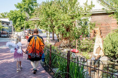 Woodland Fairy Festival - mom and daughter walking to see woodland fairies 
