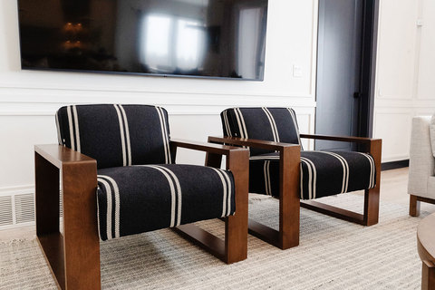 Down to Earth Projects | Eden Residence - black and white striped chairs 