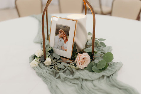 Weddings at The Gathering Place - wedding centerpiece on a table 