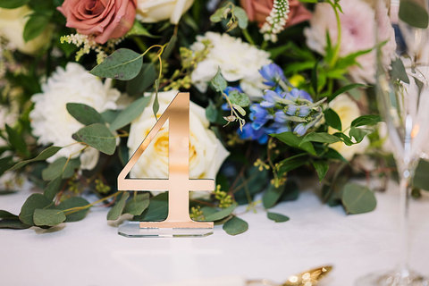 Weddings at The Gathering Place - table flowers at a wedding 