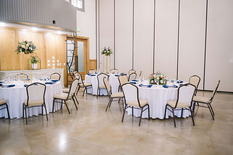 Weddings at The Gathering Place - table set up in half the ballroom 