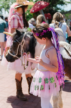 Woodland Fairy Festival - unicorn pony with girl dressed as a fairy 