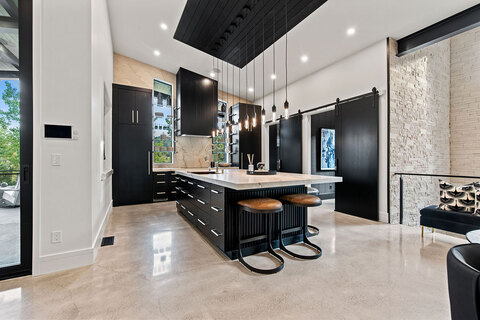 Down to Earth Projects | Park City Parade with Riverwood Interiors - modern black kitchen in park city home 