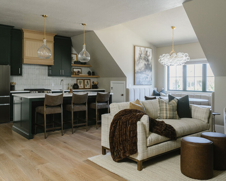 Down to Earth Projects | Utah Valley Parade at The Legacy at Meadow Ridge - Down to Earth Projects | Utah Valley Parade at The Legacy at Meadow Ridge - small second kitchen with green cabinets and sofa
