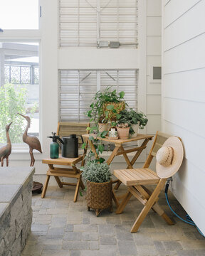 Down to Earth Projects | Utah Valley Parade at The Legacy at Meadow Ridge - outdoor seating area with chairs and plants 