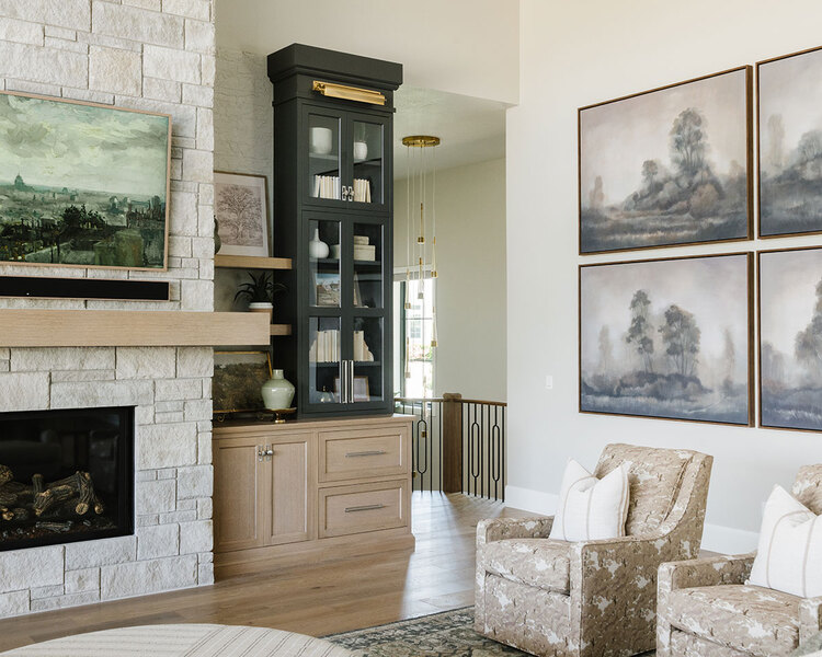 Down to Earth Projects | Utah Valley Parade at The Legacy at Meadow Ridge - Down to Earth Projects | Utah Valley Parade at The Legacy at Meadow Ridge - fireplace cabinets and furniture in family room